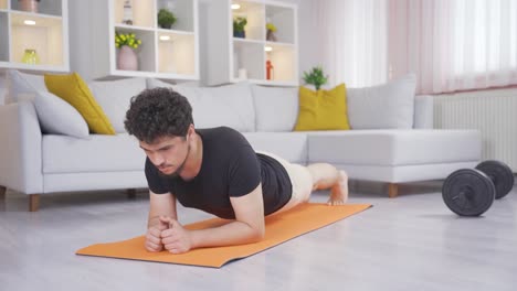 Man-doing-plank-exercise.